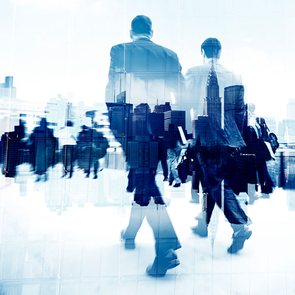 Artistic image of businessmen walking in London close to head office of Insure 313 insurance brokers.