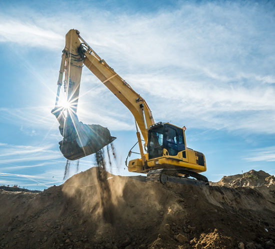 A digger on a construction site protected by plant & machinery insurance with Insure 313 insurance brokers.