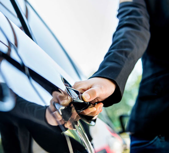 Man opening car door which is hired out and covered by private hire insurance with Insure 313.