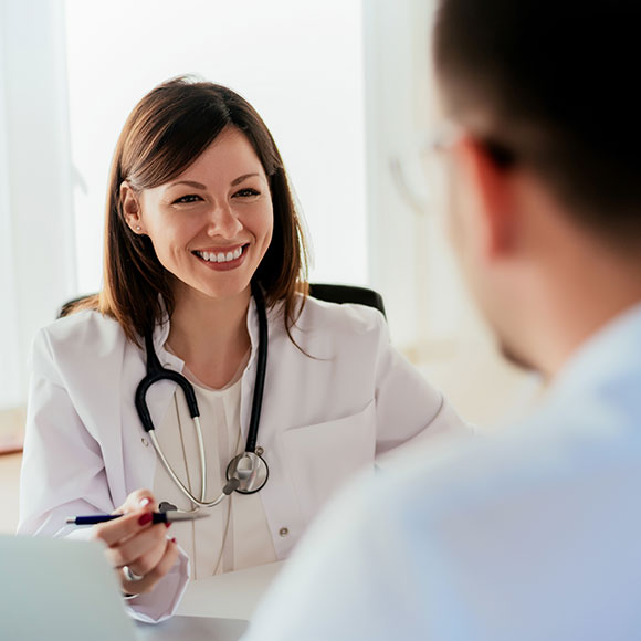 A patient receives advice from a doctor whose expertise is insured with professional indemnity by Insure 313.